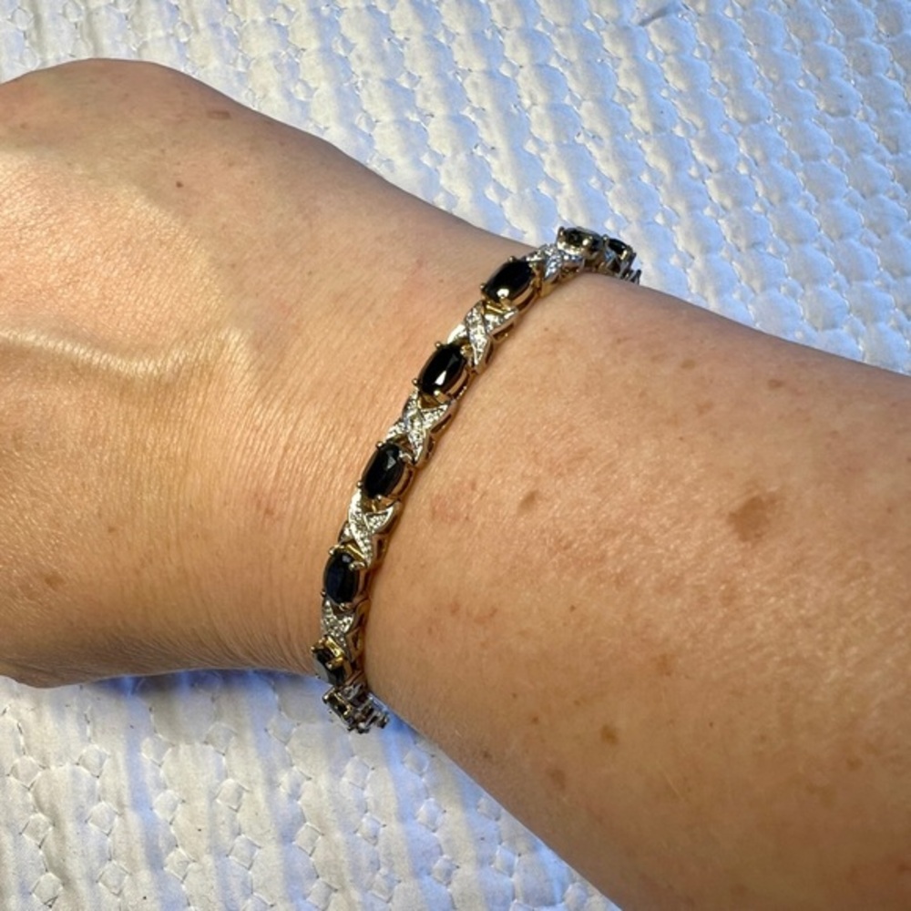 Sapphire and rhinestone tennis bracelet. 8” Faux.